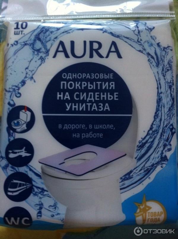 Одноразовые покрытия на сиденье унитаза Aura фото