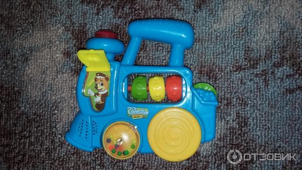 Музыкальный паровозик Fisher Price фото