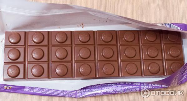 Шоколад Milka Цельный орех и карамель