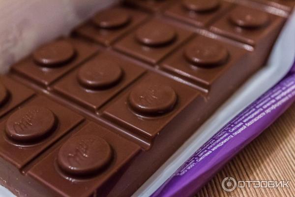 Шоколад Milka Цельный орех и карамель