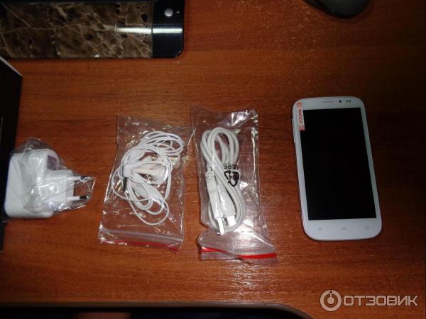 Смартфон Fly IQ4404 Spark фото