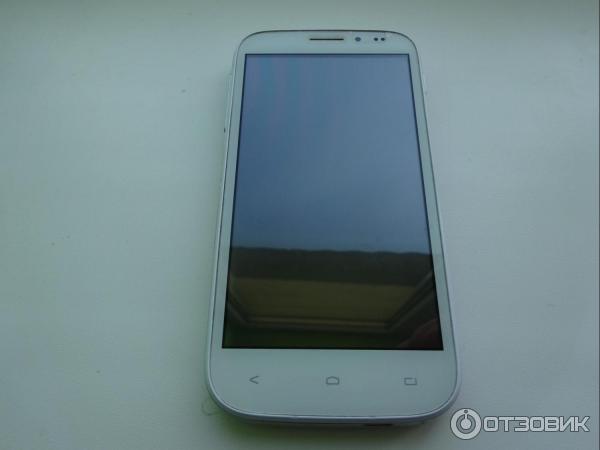 Смартфон Fly IQ4404 Spark фото