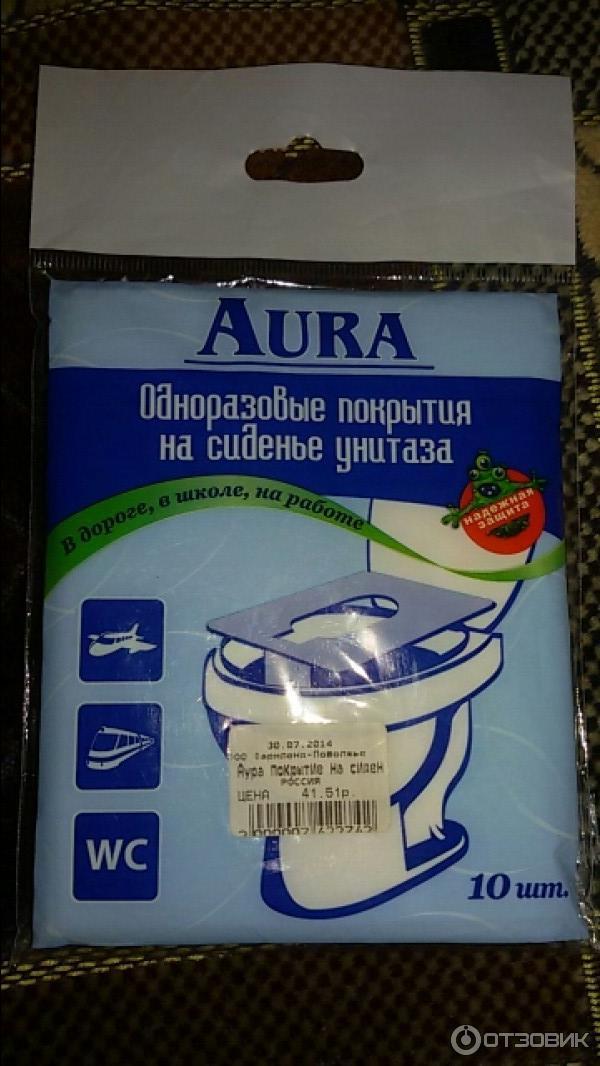 Одноразовые покрытия на сиденье унитаза Aura фото