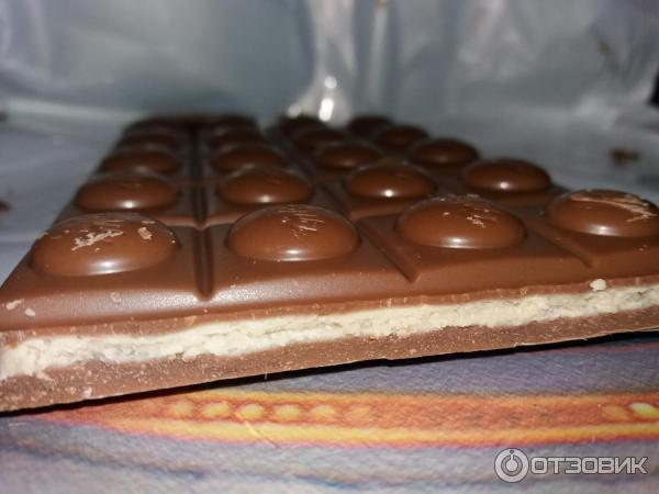 Шоколад Milka Toffee Wholenut с целыми лесными орехами, молочной и карамельной начинкой фото