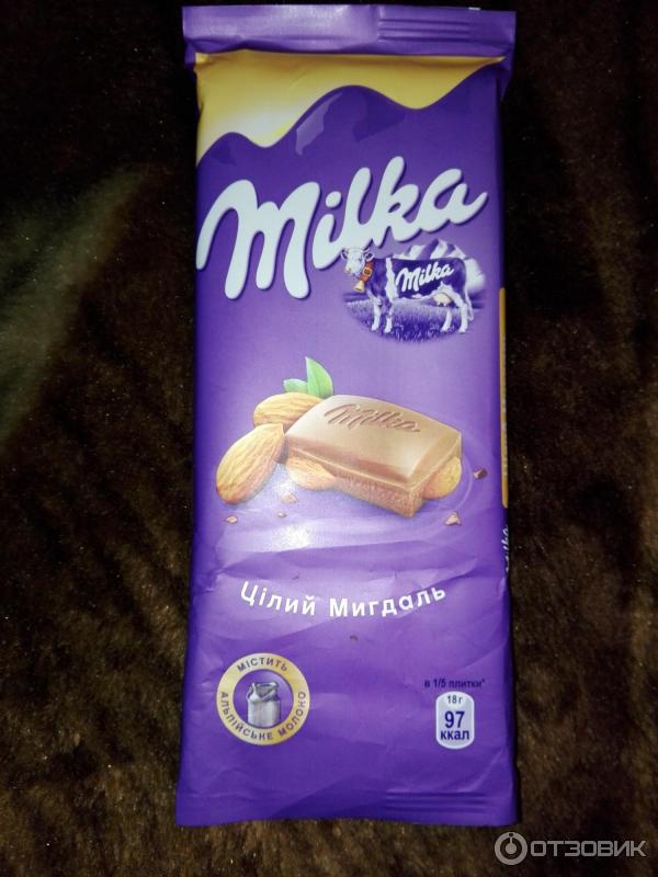 Шоколадка Milka Цельный миндаль фото