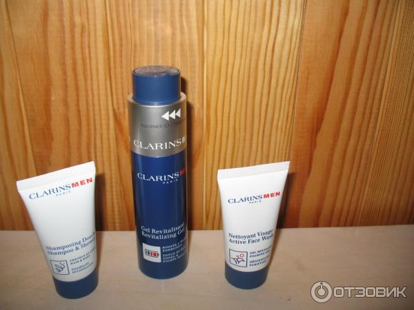 Набор средств ухода clarins men в косметичке фото