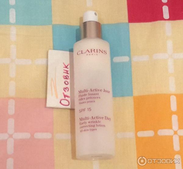 Дневной лосьон Clarins для борьбы с первыми возрастными изменениями Multi-Active Jour фото