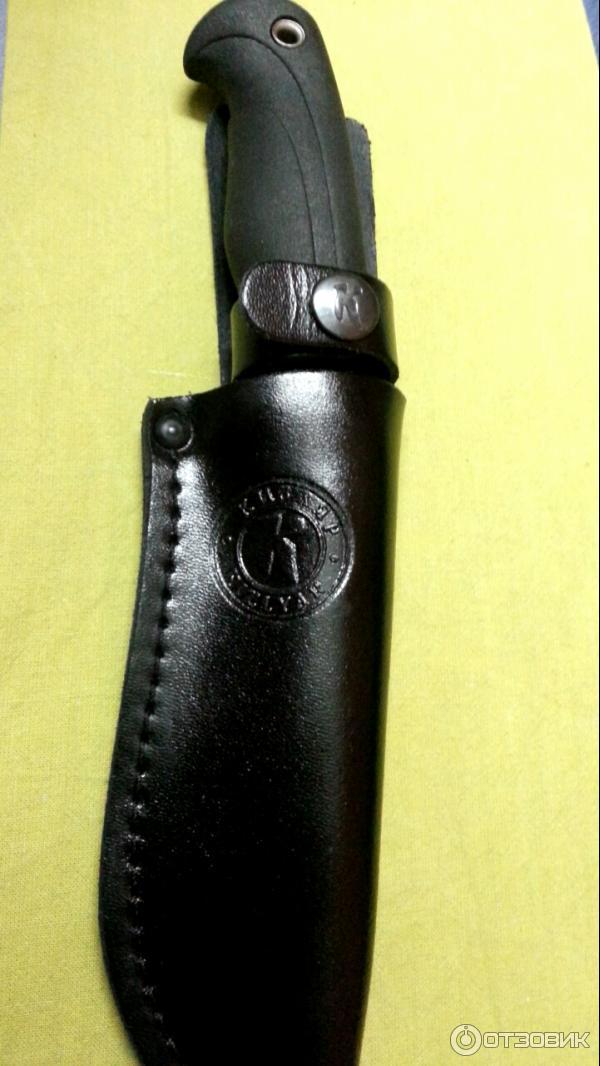 Нож в чехле.