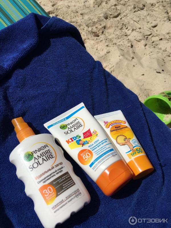 Солнцезащитный крем Garnier ambre solaire kids аква-крем SPF 50 фото