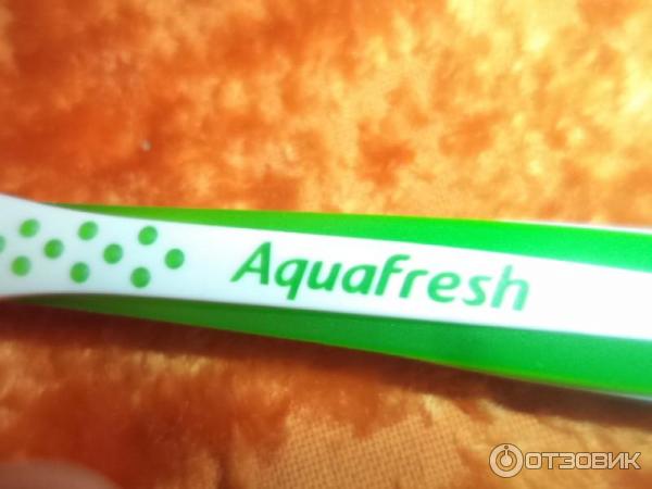 Зубная щетка Aquafresh in-between clean фото